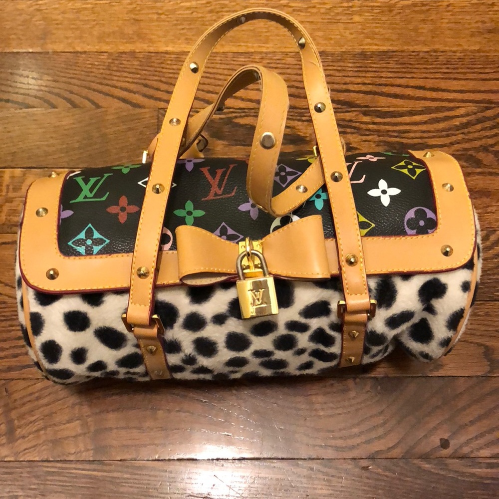 Small Louis Vuitton Purse.